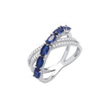 Sterling Silver Cross Over Clear & Blue Cubic Zirconias Ring